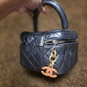 Chanel Black Quilted Mini Bag with Gold Accents